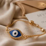 Bracelet oeil protecteur en acier inox doré, œil bleu émaillé